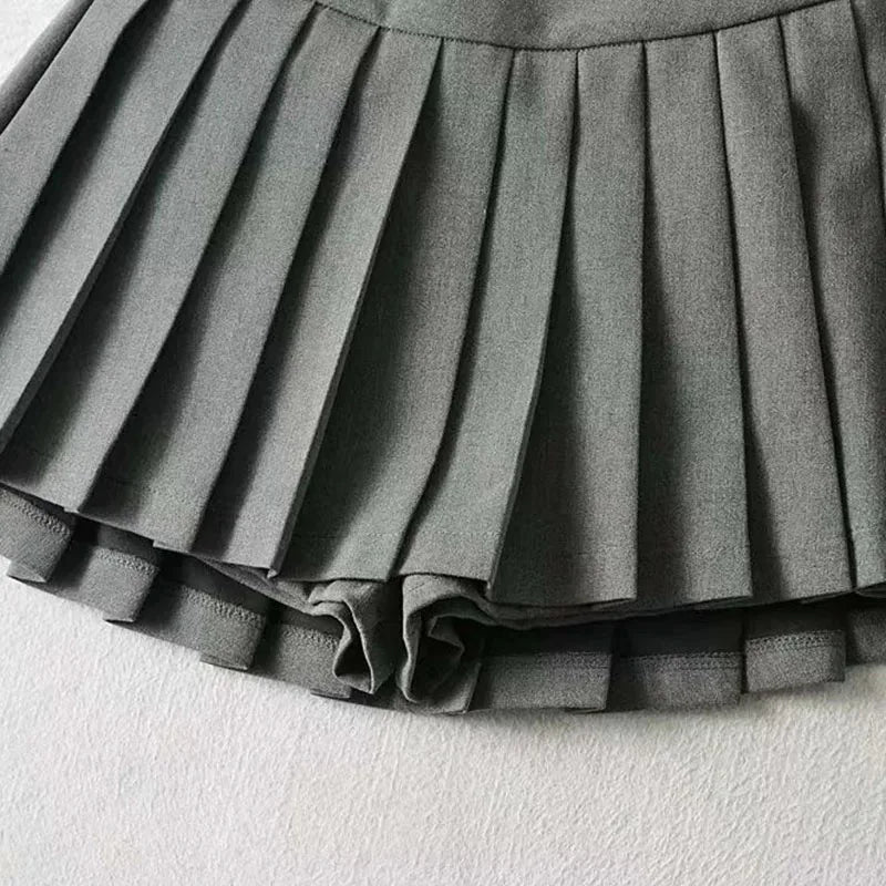 Spice girl pleated skirt female pure color small short skirt summer new Korean version JK college wind high waist mini skirt